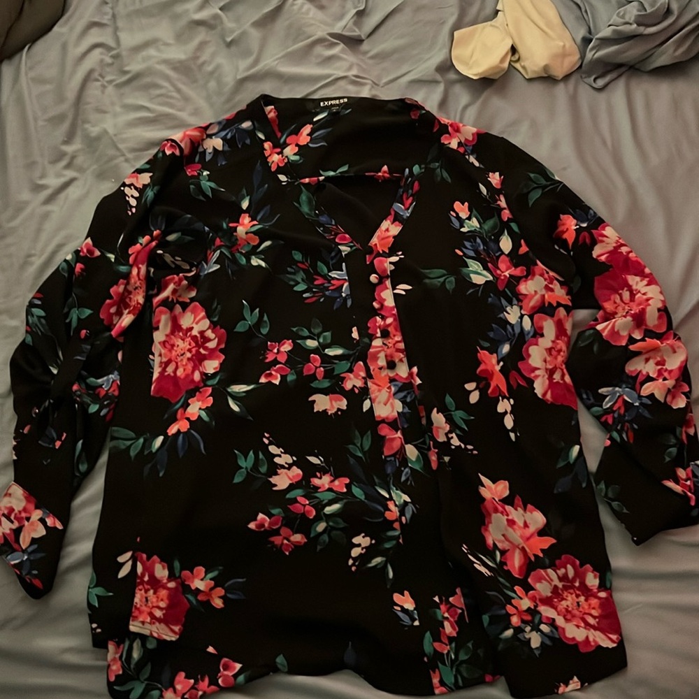 Size Large Express, Black background and pink and blue floral pattern with green